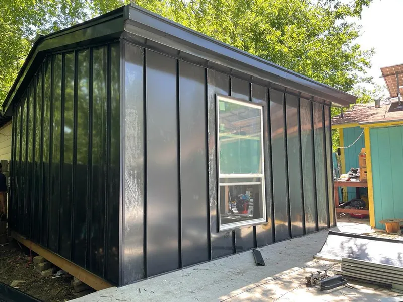 Black standing seam metal wall panels for Metal Roof Installation in Glen Rock